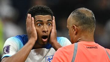 Soccer Football - FIFA World Cup Qatar 2022 - Quarter Final - England v France - Al Bayt Stadium, Al Khor, Qatar - December 10, 2022 England's Jude Bellingham remonstrates with referee Wilton Sampaio REUTERS/Dylan Martinez     TPX IMAGES OF THE DAY