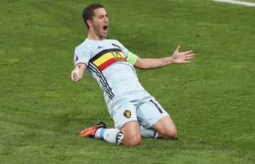 Chelsea's Eden Hazard slides on his knees after scoring his team's third against Hungary. He also provided an assist in the match where the "potential" of this team seen by many, could have at last arrived.