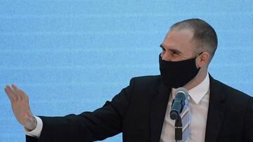 FILE PHOTO: Argentina's Economy Minister Martin Guzman waves before attending a news conference to give details about the agreement with major private creditors to restructure Argentina's sovereign debt, in Buenos Aires, Argentina August 31, 2020. Juan Mabromata/Pool via REUTERS/File Photo