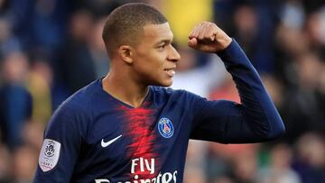 Soccer Football - Ligue 1 - Paris St Germain v Nimes Olympique - Parc des Princes, Paris, France - February 23, 2019 Paris St Germain's Kylian Mbappe celebrates a goal before it is disallowed due to handball after a referral to VAR REUTERS/Gonzalo