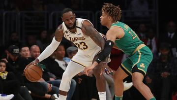 LOS ANGELES, CALIFORNIA - FEBRUARY 23: LeBron James #23 of the Los Angeles Lakers handles the ball against Romeo Langford #45 of the Boston Celtics during the third quarter at Staples Center on February 23, 2020 in Los Angeles, California.   Katelyn Mulcahy/Getty Images/AFP
 == FOR NEWSPAPERS, INTERNET, TELCOS &amp; TELEVISION USE ONLY ==