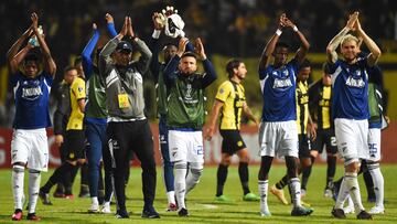 Millonarios' players celebrate at the end of the Copa Sudamericana group stage first leg football match between Pe�arol and Millonarios at the Campeon del Siglo stadium in Montevideo on April 20, 2023. (Photo by DANTE FERNANDEZ / AFP)