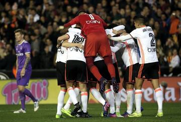 Valencia's players celebrate their win over Real.