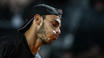 Argentina's Francisco Cerundolo reacts during his quarterfinals match of the Men's ATP Rome Open tennis tournament against Norway's Casper Ruud, at Foro Italico in Rome on May 17, 2023. cerund (Photo by Tiziana FABI / AFP)