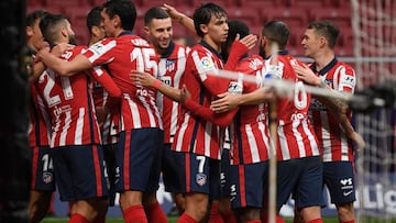 Atletico Madrid&#039;s players celebrate their second goal scored by Uruguayan forward Luis Suarez during the Spanish league football match between Club Atletico de Madrid and Elche CF at the Wanda Metropolitano stadium in Madrid on December 19, 2020. (Ph