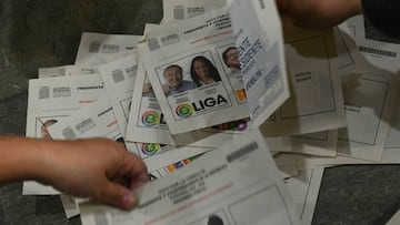 Officials count votes after the presidential runoff election in Medellin, Colombia, on June 19, 2022. - Counting began after Colombians voted on Sunday in a presidential election filled with uncertainty, as ex-guerrilla Gustavo Petro and millionaire businessman Rodolfo Hernandez vie for power in a country saddled with widespread poverty, an uptick in violence and other woes. (Photo by JOAQUIN SARMIENTO / AFP) (Photo by JOAQUIN SARMIENTO/AFP via Getty Images)