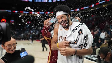 PORTLAND, OREGON - FEBRUARY 01: Jarrett Allen #31 is doused with water by teammate Donovan Mitchell #45 of the Cleveland Cavaliers after the game against the Portland Trail Blazers at Moda Center on February 01, 2026 in Portland, Oregon. NOTE TO USER: User expressly acknowledges and agrees that, by downloading and or using this photograph, User is consenting to the terms and conditions of the Getty Images License Agreement. Soobum Im/Getty Images/AFP (Photo by Soobum Im / GETTY IMAGES NORTH AMERICA / Getty Images via AFP)