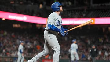 SAN FRANCISCO, CALIFORNIA - APRIL 12: Max Muncy #13 of the Los Angeles Dodgers watches the flight of his ball as he hits a three-run home run against the San Francisco Giants in the top of the six inning at Oracle Park on April 12, 2023 in San Francisco, California.   Thearon W. Henderson/Getty Images/AFP (Photo by Thearon W. Henderson / GETTY IMAGES NORTH AMERICA / Getty Images via AFP)