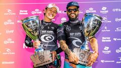 NEWCASTLE, AUS - APRIL 10: Four-time WSL Champion Carissa Moore of Hawaii and WSL Champion Italo Ferreira, winners of the finals of the Rip Curl Newcastle Cup presented by Corona on April 10, 2021 in Newcastle, Australia. (Photo by Matt Dunbar/World Surf 