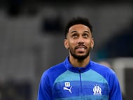 Marseille's Gabonese forward #97 Pierre-Emerick Aubameyang warms up ahead of the French L1 football match between Olympique de Marseille (OM) and RC Lens at the Stade Velodrome in Marseille, southern France, on January 24, 2026. (Photo by Miguel MEDINA / AFP)