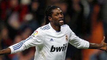 Real Madrid's Emmanuel Adebayor celebrates a goal against Sevilla in his debut match during their Spanish King's Cup semi-final second leg match at the Santiago Bernabeu stadium in Madrid February 2, 2011.       REUTERS/Susana Vera (SPAIN  - Tags: SPORT SOCCER)