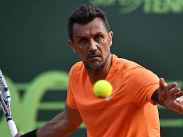 AC Milan&#039;s former player Paolo Maldini returns the ball during the men&#039;s doubles tennis match, with his partner Stefano Landonio against Poland&#039;s player Tomasz Bednarek and Nederland&#039;s player David Pel during the ATP Challenger Tour on