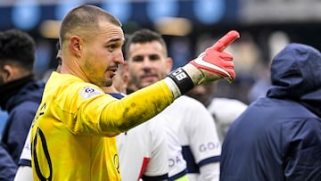 Paris Saint-Germain's Spanish goalkeeper #80 Arnau Tenas celebrates after winning at the end of the French L1 football match between Le Havre AC and Paris Saint-Germain (PSG) at The Stade Oceane in Le Havre, north-western France, on December 3, 2023. (Photo by DAMIEN MEYER / AFP)