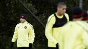 <b>DISTANCIADOS. </b>Rooney y Ferguson se mostraron fríos y distantes en el entrenamiento de ayer.