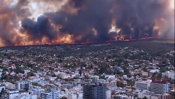 Residents of Villa Carlos Paz are evacuating after an accidental fire was started, spreading out of control and engulfing the entire city in flames.