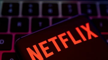 FILE PHOTO: Smartphone with Netflix logo is placed on a keyboard in this illustration created on April 19, 2022. REUTERS/Dado Ruvic/File Photo