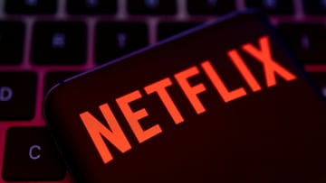 FILE PHOTO: Smartphone with Netflix logo is placed on a keyboard in this illustration created on April 19, 2022. REUTERS/Dado Ruvic/File Photo