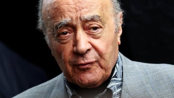 FILE PHOTO: Fulham's chairman Mohamed Al Fayed listens as Fulham's new manager Mark Hughes speaks during a news conference at Craven Cottage stadium in London August 3, 2010. REUTERS/Luke MacGregor/File Photo