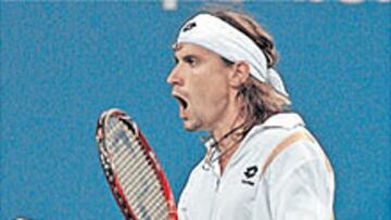 <b>CORREDOR DE FONDO. </b>David Ferrer celebra un punto ante Nadal.
