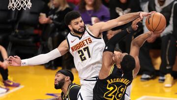 Denver Nuggets guard Jamal Murray (C) blocks a shot by Los Angeles Lakers forward Rui Hachimura (R) during the first half of the NBA basketball game between the Denver Nuggets and the Los Angeles Lakers in Los Angeles, California USA, 08 February 2024.