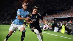 Celta Vigo's Spanish defender #03 Oscar Mingueza vies with Real Madrid's Spanish defender #20 Fran Garcia during the Spanish Liga football match between RC Celta de Vigo and Real Madrid CF at the Balaidos stadium in Vigo on August 25, 2023. (Photo by MIGUEL RIOPA / AFP)