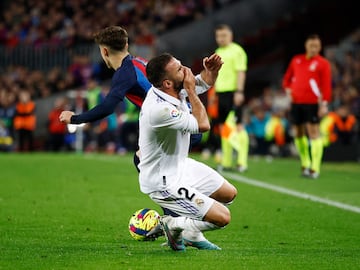 As he tussled for the ball with Gavi in the second half at the Camp Nou, Carvajal fell to the turf after an apparent elbow by the Barcelona midfielder, who wasn’t booked.