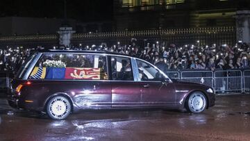 The hearse carrying the coffin of Queen Elizabeth II arrives at Buckingham Palace in London, UK, on Tuesday, Sept. 13, 2022. Queen Elizabeth II died at her estate in Balmoral, Scotland, about three months after the country celebrated her Platinum Jubilee, marking 70 years of service. Photographer: Carlos Jasso/Bloomberg via Getty Images