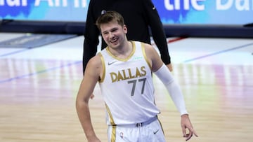 Apr 5, 2021; Dallas, Texas, USA; Dallas Mavericks guard Luka Doncic (77) reacts during the first half against the Utah Jazz at American Airlines Center. Mandatory Credit: Kevin Jairaj-USA TODAY Sports