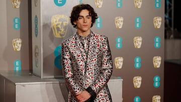 (FILES) In this file photo taken on February 10, 2019 French-US actor Timothee Chalamet poses on the red carpet upon arrival at the BAFTA British Academy Film Awards at the Royal Albert Hall in London. - New York&#039;s star-studded Met Gala will focus on youth and diversity this year, with four co-chairs under the age of 30 -- actor Timothee Chalamet, poet Amanda Gorman, singer Billie Eilish and tennis player Naomi Osaka. (Photo by Tolga AKMEN / AFP)