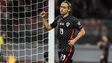 Croatia&#039;s midfielder Lovro Majer celebrates after scoring his side&#039;s 5th goal during the FIFA World Cup Qatar 2022 qualification Group H football match between Malta and Croatia on November 11, 2021 at the Ta&#039;Qali national stadium in Attard, Malta. (Photo by Matthew MIRABELLI / AFP)