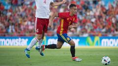 Georgia&#039;s defender Guram Kashia (L) vies with Spain&#039;s midfielder Lucas Vazquez during the EURO 2016 friendly football match Spain vs Georgia at the Coliseum Alfonso Perez stadium in Getafe, on June 7, 2016, in preparation for the upcoming Euro 2016 European football championship. / AFP PHOTO / CURTO DE LA TORRE