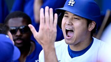 LOS ANGELES, CALIFORNIA - SEPTEMBER 22: Shohei Ohtani #17 of the Los Angeles Dodgers is congratulated after hitting a game tying home run in the ninth inning against the Colorado Rockies at Dodger Stadium on September 22, 2024 in Los Angeles, California. John McCoy/Getty Images/AFP (Photo by John MCCOY / GETTY IMAGES NORTH AMERICA / Getty Images via AFP)
