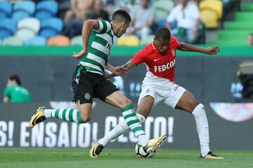 Still in play | Monaco forward Kylian Mbappe vies with Sporting CP midfielder Rodrigo Battaglia in pre-season friendly.