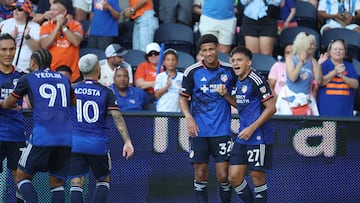 Jul 6, 2024; Cincinnati, Ohio, USA; FC Cincinnati midfielder Yamil Asad (27) celebrates with defender Ian Murphy (32) after scoring a goal against Inter Miami CF in the first half at TQL Stadium. Mandatory Credit: Trevor Ruszkowski-USA TODAY Sports