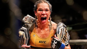 DALLAS, TEXAS - JULY 30: Amanda Nunes of Brazil celebrates after defeating Julianna Pena in their bantamweight title bout during UFC 277 at American Airlines Center on July 30, 2022 in Dallas, Texas. Amanda Nunes won via unanimous decision.   Carmen Mandato/Getty Images/AFP
== FOR NEWSPAPERS, INTERNET, TELCOS & TELEVISION USE ONLY ==