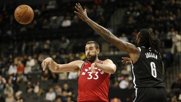 Oct 18, 2019; Brooklyn, NY, USA; Toronto Raptors center Marc Gasol (33) moves the ball against Brooklyn Nets center Deandre Jordan (6) in the second quarter at Barclays Center. Mandatory Credit: Nicole Sweet-USA TODAY Sports