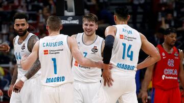 Basketball - EuroLeague Final Four Semi Final A - CSKA Moscow vs Real Madrid - ?Stark Arena?, Belgrade, Serbia - May 18, 2018 Real Madrid's Luka Doncic with Gustavo Ayon and Fabien Causeur REUTERS/Alkis Konstantinidis