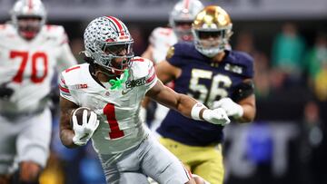 Jan 20, 2025; Atlanta, GA, USA; Ohio State Buckeyes running back Quinshon Judkins (1) runs with the ball against the Notre Dame Fighting Irish during the first half the CFP National Championship college football game at Mercedes-Benz Stadium. Mandatory Credit: Mark J. Rebilas-Imagn Images