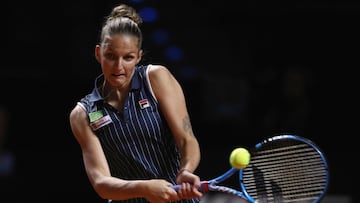Pliskova battles past Ostapenko after Halep crashes out