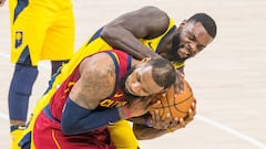 Apr 22, 2018; Indianapolis, IN, USA; Indiana Pacers guard Lance Stephenson (1) wraps up the ball for a jump ball over Cleveland Cavaliers forward LeBron James (23) in the second half of game four in the first round of the 2018 NBA Playoffs at Bankers Life Fieldhouse. Mandatory Credit: Trevor Ruszkowski-USA TODAY Sports