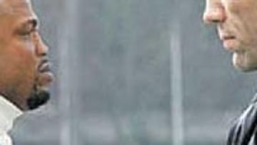 <b>COLOSOS. </b>Jameel McCline le toma la medida a Valuev.