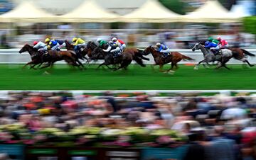Este barrido fotogr¨¢fico en Royal Ascot muestra al p¨²blico difuminado al tiempo que caballos y jinetes se aprecian con total nitidez durante la carrera del Kensington Palace Fillies Handicap. El jockey Colin Kean, montando a Villanova Queen, se impuso en el segundo d¨ªa de carreras en la cita favorita de la alta sociedad brit¨¢nica.