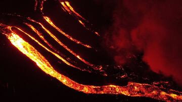 LA PALMA, SPAIN - NOVEMBER 10: The Lava flow from the Cumbre Vieja volcano hits the sea as it continues to erupt on November 10, 2021 in La Palma, Spain. The volcano has been erupting since September 19, 2021 after weeks of seismic activity, resulting in 