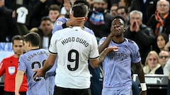 Real Madrid's Brazilian forward #07 Vinicius Junior argues with Valencia's Spanish forward #09 Hugo Duro during the Spanish league football match between Valencia CF and Real Madrid at the Mestalla stadium in Valencia on March 2, 2024 (Photo by JOSE JORDAN / AFP)