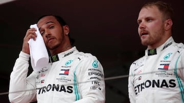 FILE PHOTO: Formula One F1 - Monaco Grand Prix - Circuit de Monaco, Monte Carlo, Monaco - May 26, 2019 Mercedes' Lewis Hamilton celebrates winning the Monaco Grand Prix with third place Mercedes' Valtteri Bottas REUTERS/Benoit Tessier/File Photo