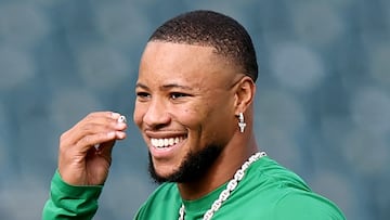 PHILADELPHIA, PENNSYLVANIA - DECEMBER 29: Saquon Barkley #26 of the Philadelphia Eagles smiles during warmups before a game against the Dallas Cowboys at Lincoln Financial Field on December 29, 2024 in Philadelphia, Pennsylvania. Emilee Chinn/Getty Images/AFP (Photo by Emilee Chinn / GETTY IMAGES NORTH AMERICA / Getty Images via AFP)