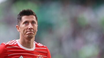 Bayern Munich's Polish forward Robert Lewandowski reacts after the German first division Bundesliga football match VfL Wolfsburg v Bayern Munich in Wolfsburg, northern Germany, on May 14, 2022. (Photo by Ronny Hartmann / AFP) / DFL REGULATIONS PROHIBIT ANY USE OF PHOTOGRAPHS AS IMAGE SEQUENCES AND/OR QUASI-VIDEO