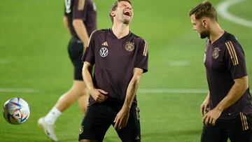 Soccer Football - FIFA World Cup Qatar 2022 - Germany Training - Al Shamal Stadium, Al Shamal, Qatar - November 29, 2022  Germany's Thomas Muller and Niclas Fullkrug during training REUTERS/Annegret Hilse