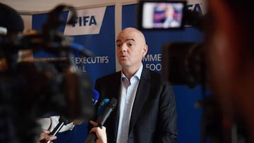 FIFA President Gianni Infantino addresses journalists during a press briefing at a hotel in Roissy-en-France, north of Paris, on November 23, 2016.