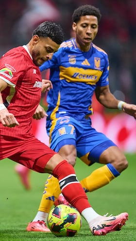 Alexis Vega (L) of Toluca fights for the ball with Jonathan Herrera (R) of Tigres during the 5th round match between Toluca and Tigres UANL as part of the Liga BBVA MX, Torneo Clausura 2025 at Nemesio Diez Stadium, on February 01, 2025 in Toluca, Estadio de Mexico, Mexico.